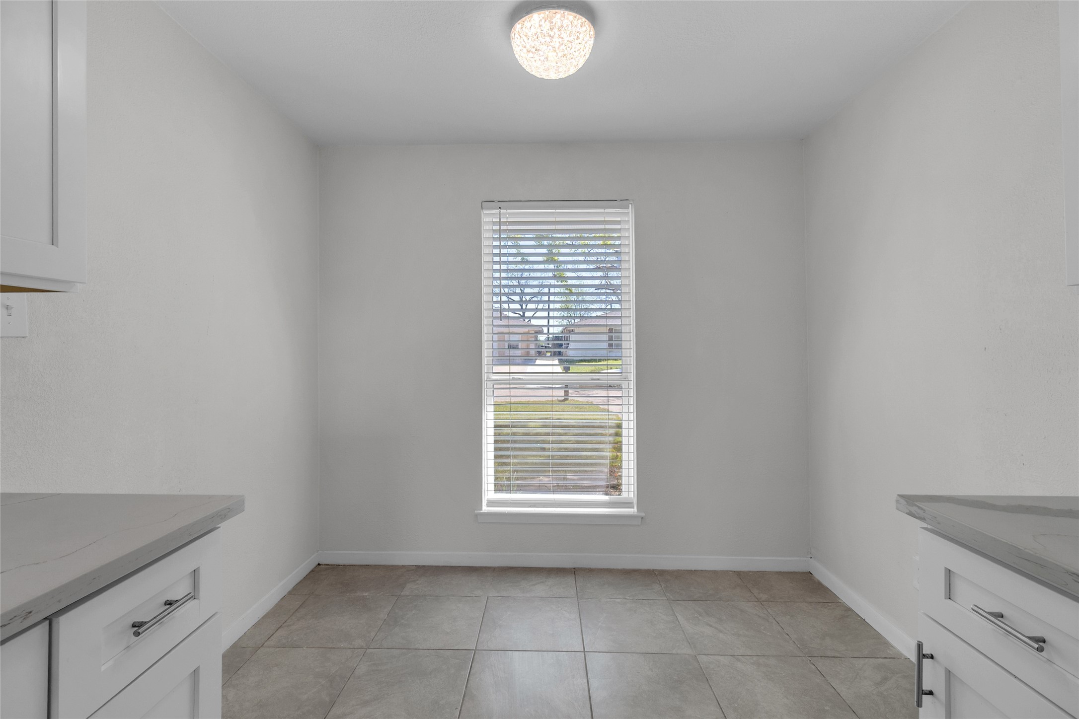 7622 Williams Street Houston, TX 77040 - Photo 12 of 42 a view of an empty room with a window