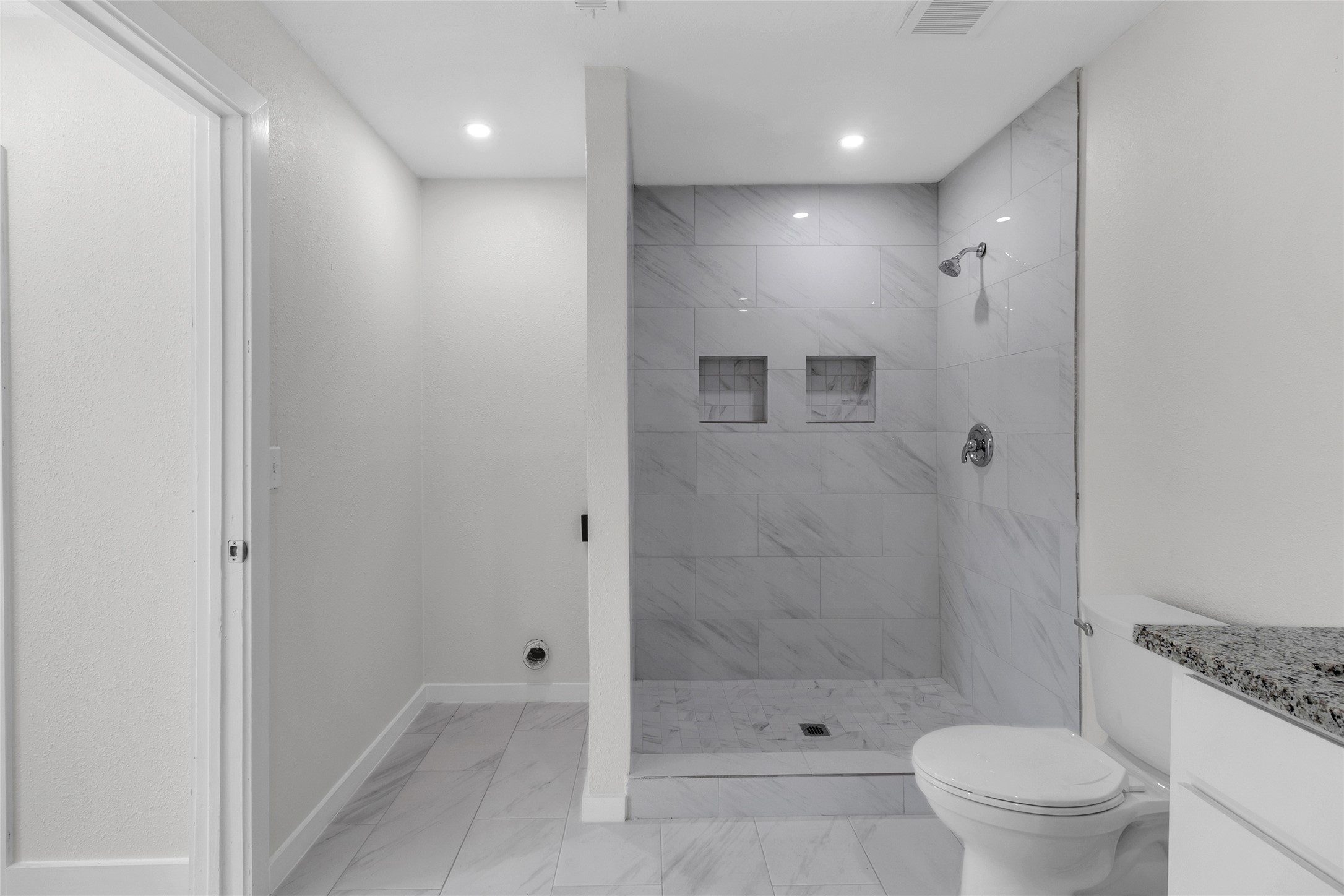 7622 Williams Street Houston, TX 77040 - Photo 22 of 42 a bathroom with a shower a toilet and sink