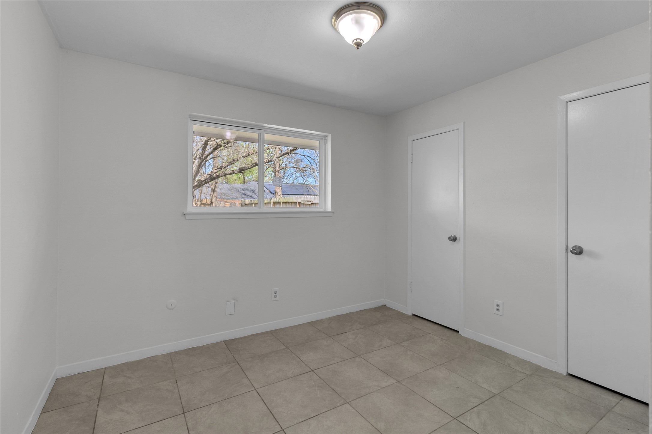 7622 Williams Street Houston, TX 77040 - Photo 29 of 42 an empty room with windows