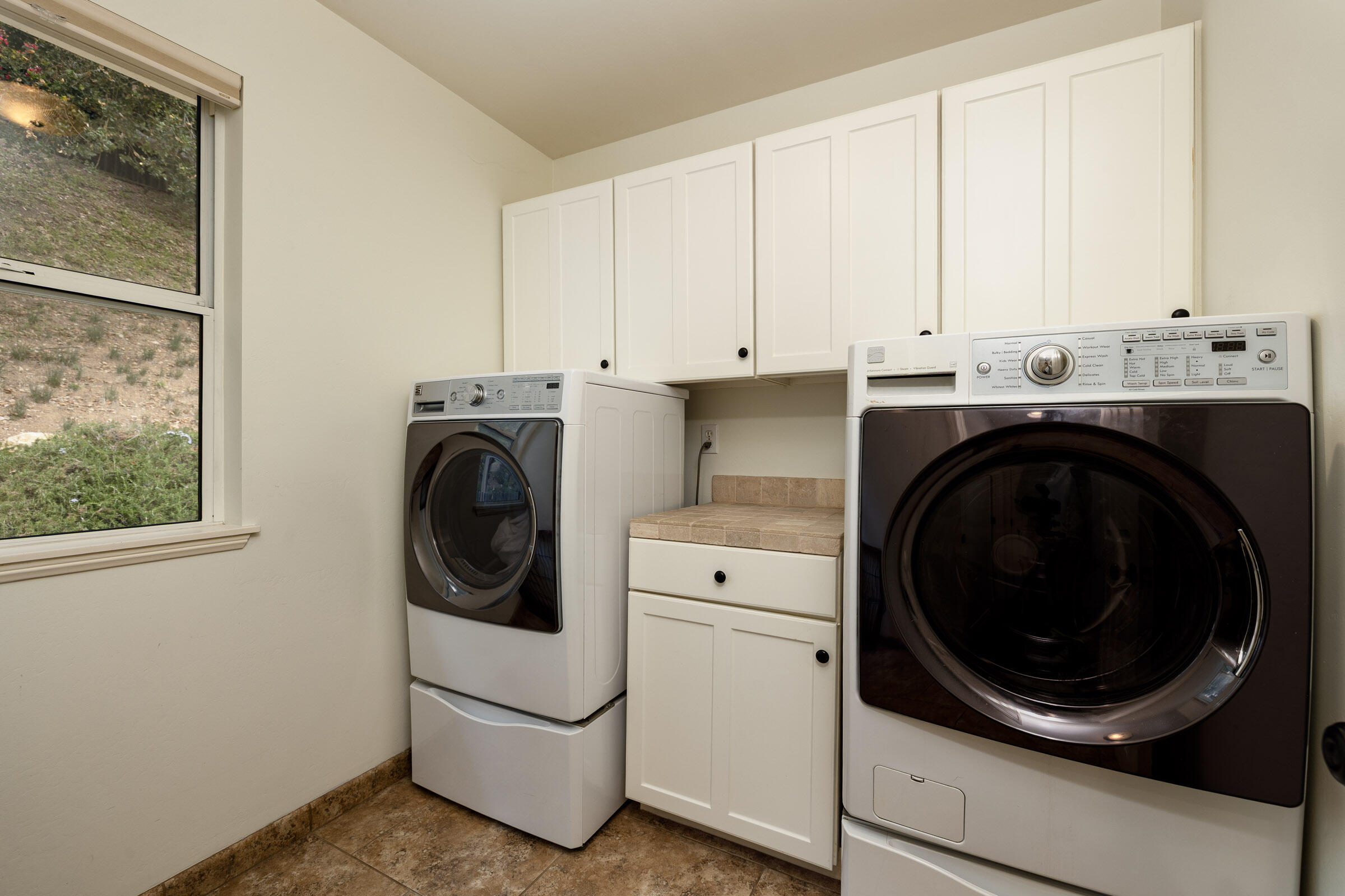 1352 Manitou Road Santa Barbara, CA 93101 - Photo 21 of 27 a utility room with sink dryer and washer