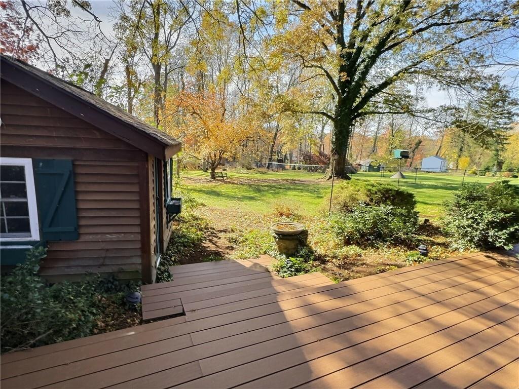 126 Rockingham Lane Canonsburg, PA 15317 - Photo 34 of 44 a view of a backyard with plants and large trees