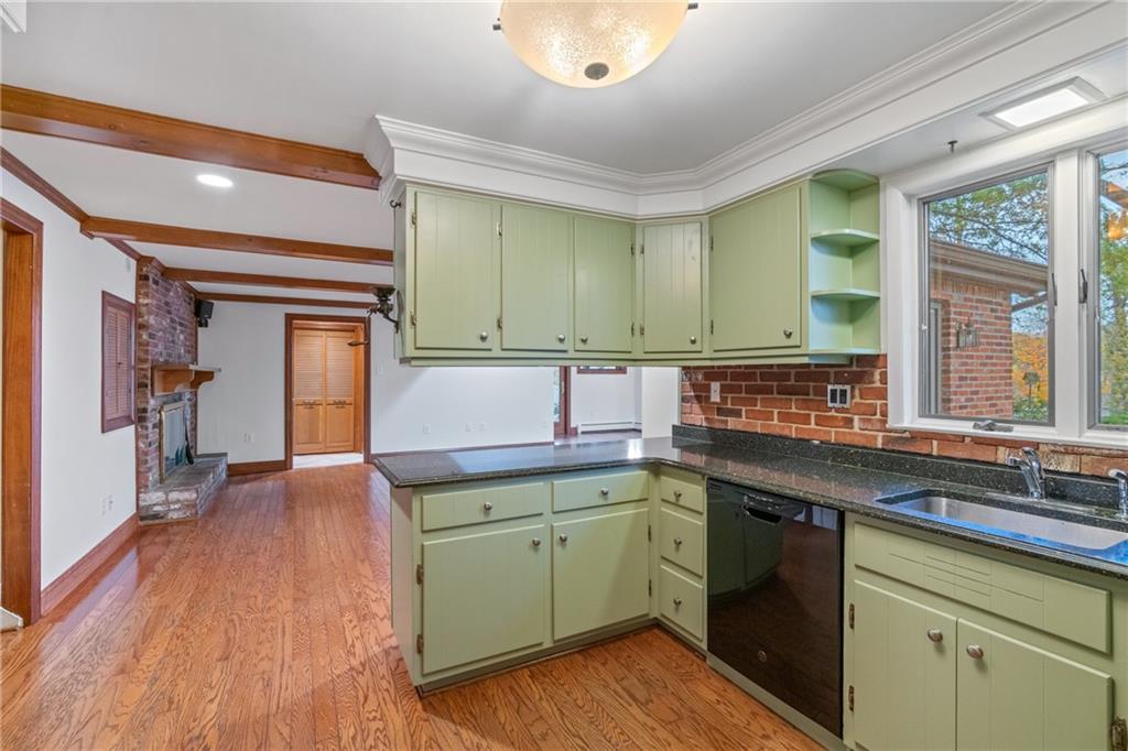 126 Rockingham Lane Canonsburg, PA 15317 - Photo 8 of 44 a kitchen with a sink and wooden cabinets