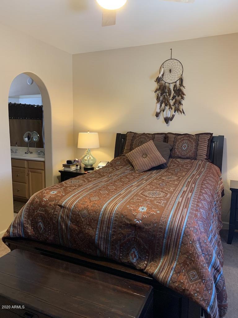 3935 East Rough Rider Road, Unit 1142 Phoenix, AZ 85050 - Photo 11 of 29 Large Master Bedroom