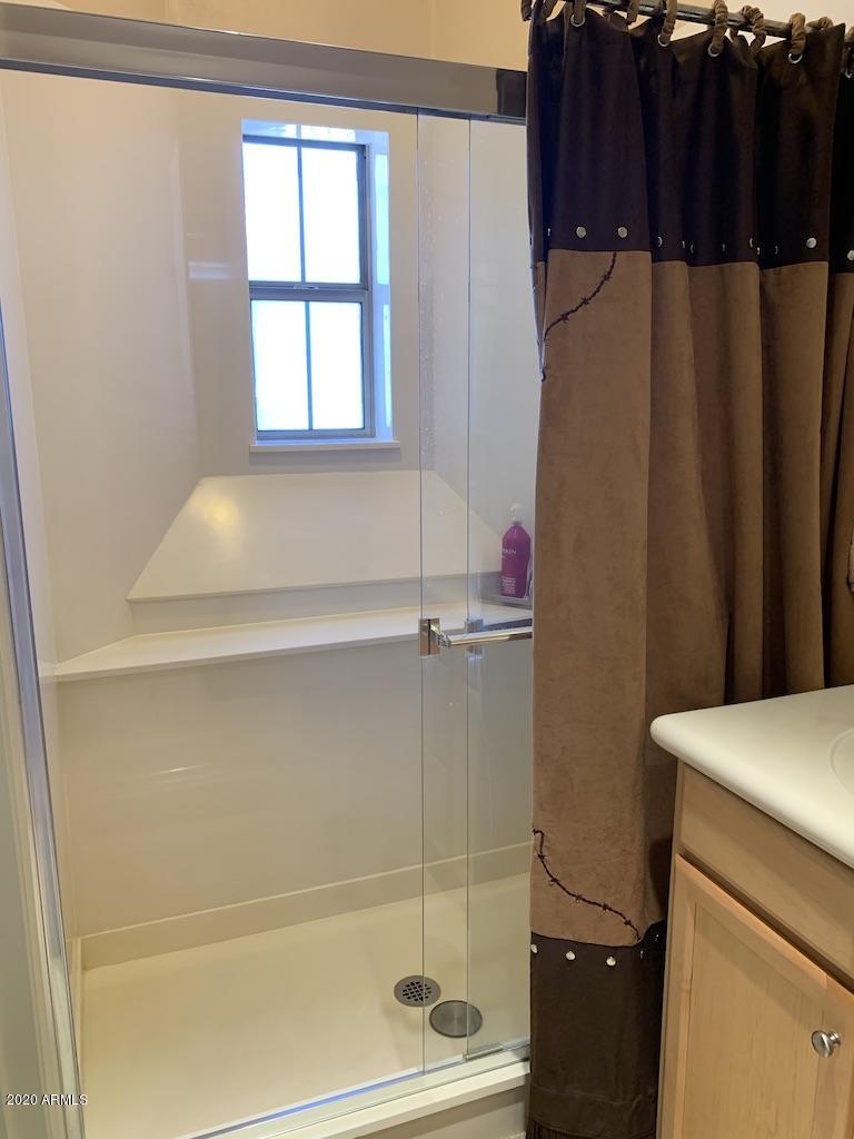 3935 East Rough Rider Road, Unit 1142 Phoenix, AZ 85050 - Photo 12 of 29 Walk-In Shower