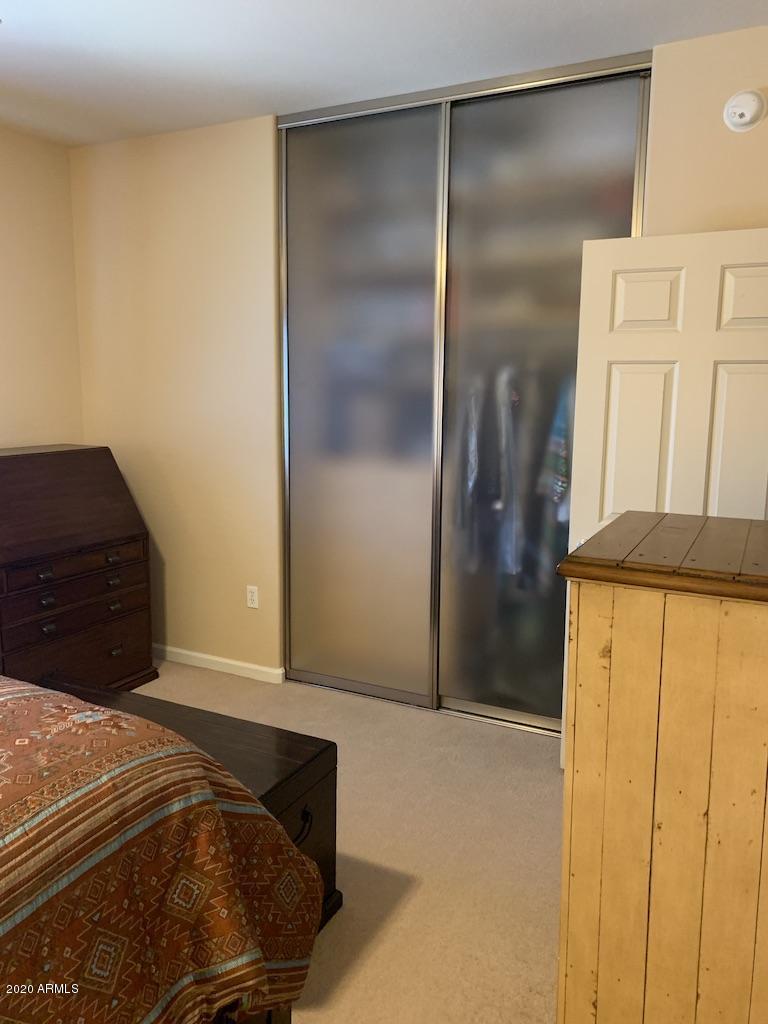 3935 East Rough Rider Road, Unit 1142 Phoenix, AZ 85050 - Photo 16 of 29 Second closet storage in Master