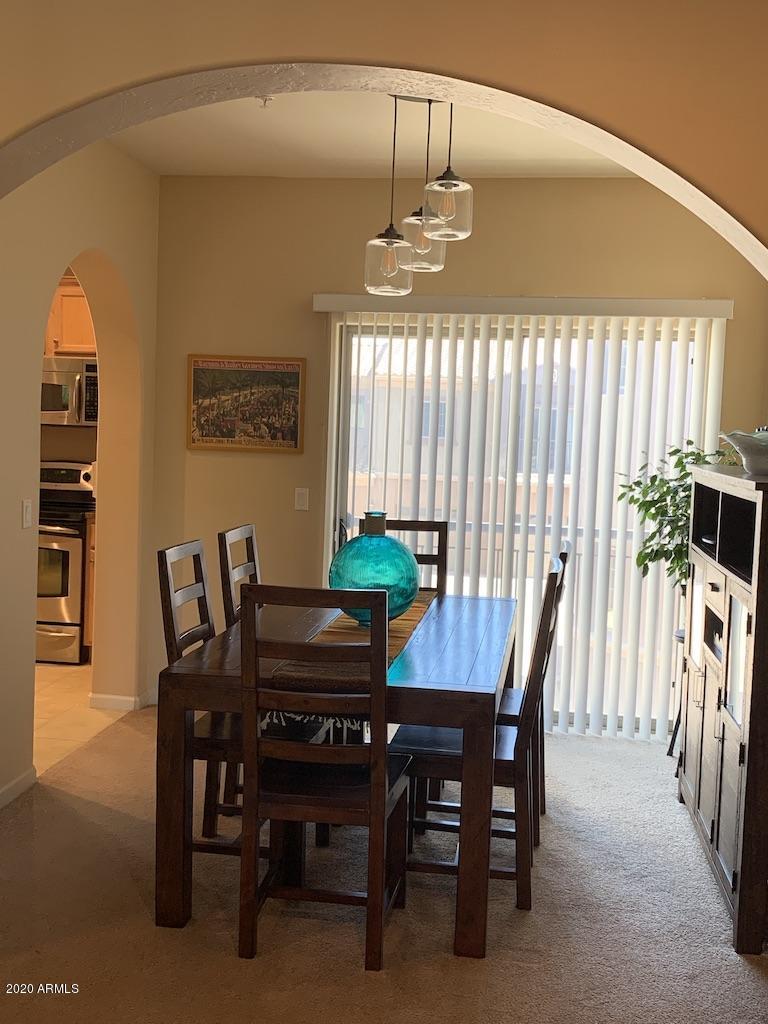 3935 East Rough Rider Road, Unit 1142 Phoenix, AZ 85050 - Photo 5 of 29 Formal dining with Balcony