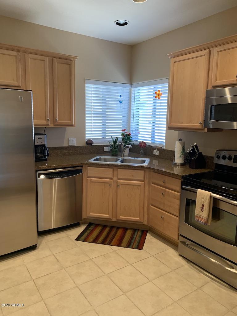 3935 East Rough Rider Road, Unit 1142 Phoenix, AZ 85050 - Photo 7 of 29 Kithen with SS appliances