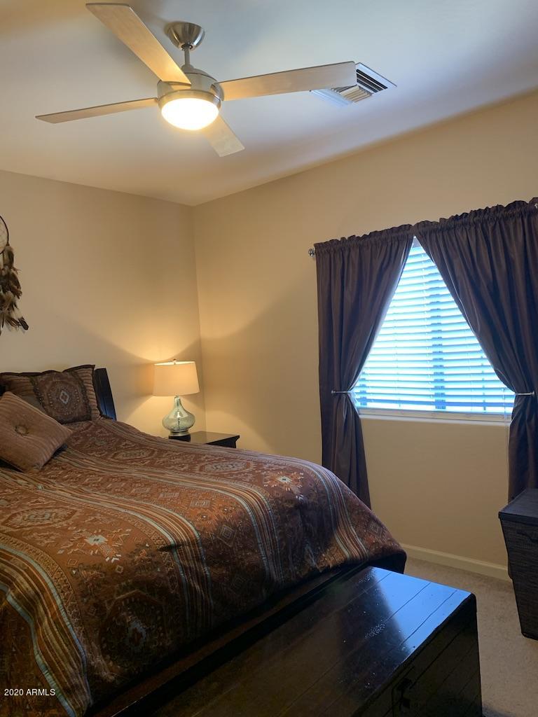 3935 East Rough Rider Road, Unit 1142 Phoenix, AZ 85050 - Photo 10 of 29 Ceiling fans