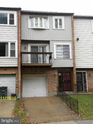 2724 2nd Street Southeast Washington, DC 20032 - Photo 1 of 4 a front view of a house with a yard and garage
