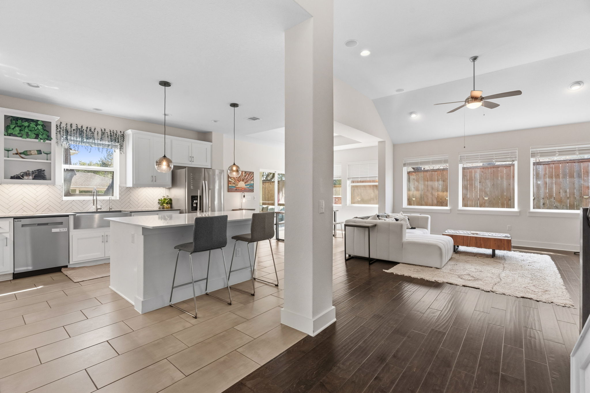 7205 Albert Road Austin, TX 78745 - Photo 13 of 37 a kitchen with white cabinets and window