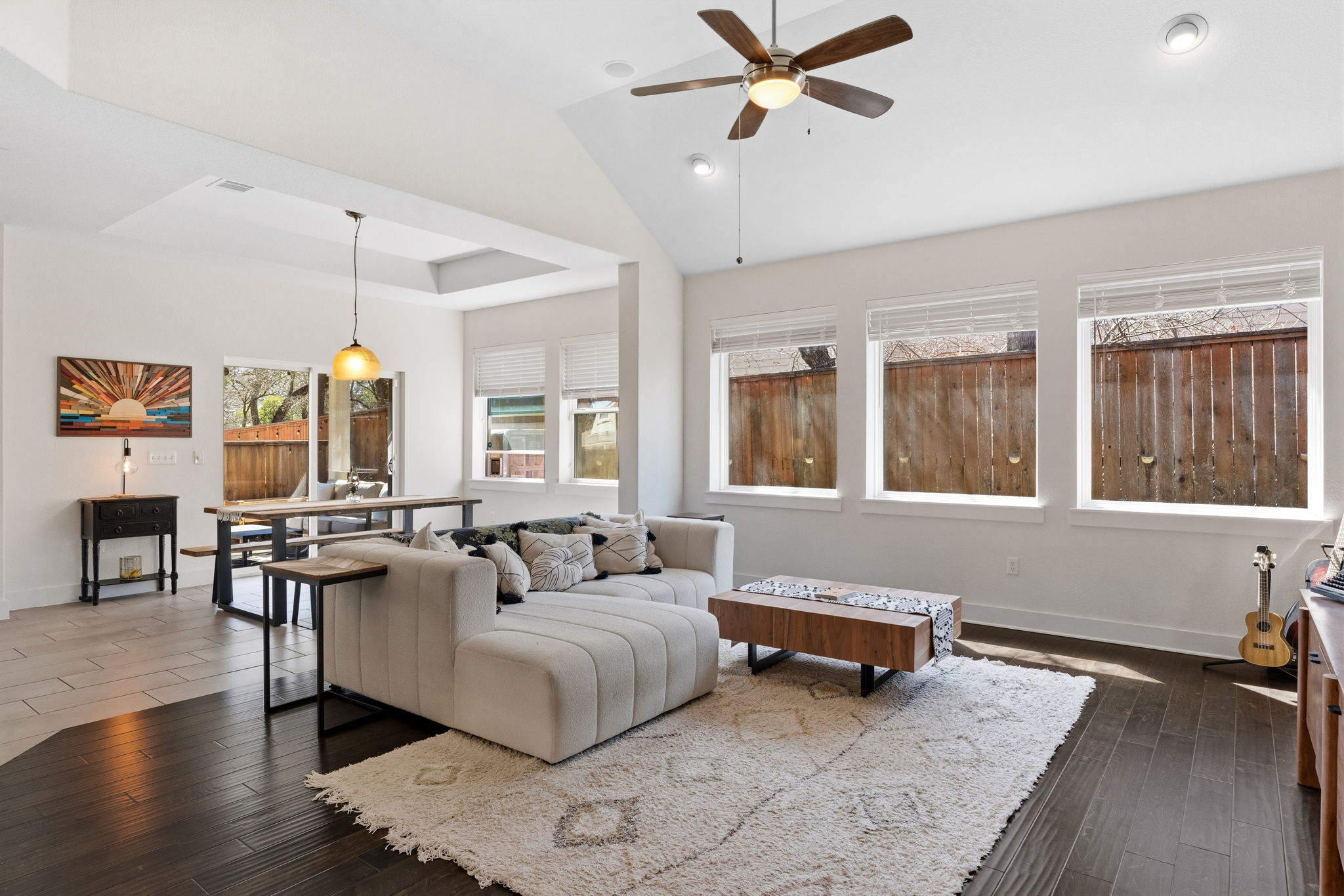 7205 Albert Road Austin, TX 78745 - Photo 15 of 24 The spacious living room rests under towering ceilings.
