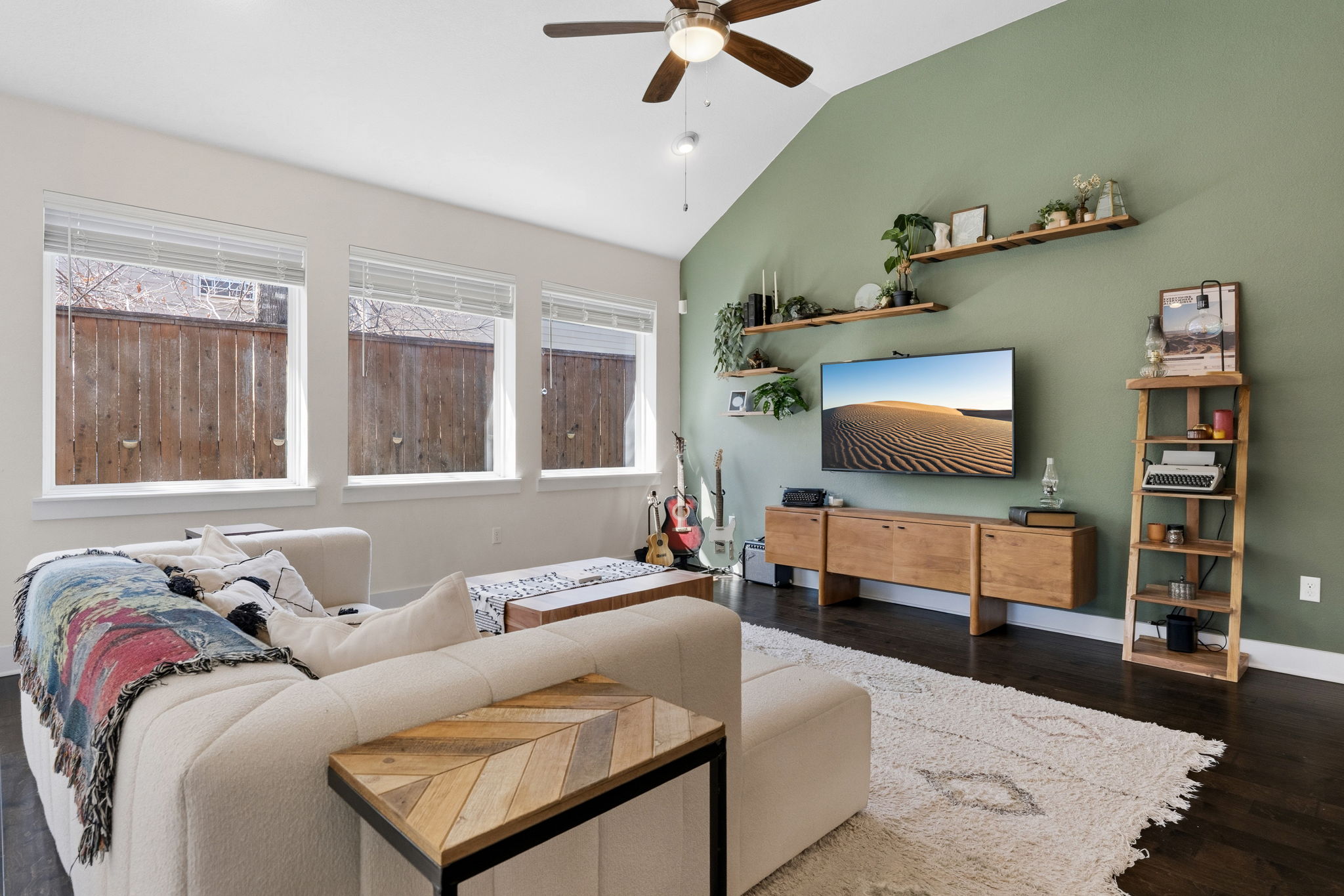 7205 Albert Road Austin, TX 78745 - Photo 15 of 37 a living room with furniture and a flat screen tv