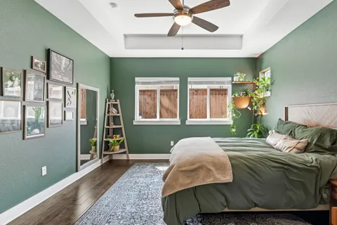 a bedroom with a bed and window