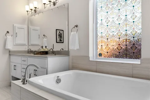 a bathroom with a bathtub and a sink