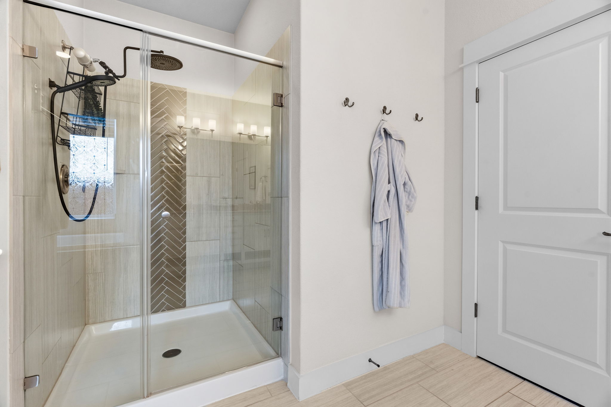7205 Albert Road Austin, TX 78745 - Photo 22 of 37 a bathroom with a glass shower door