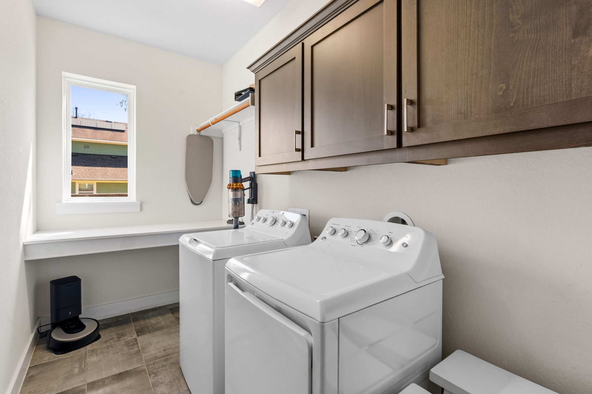 7205 Albert Road Austin, TX 78745 - Photo 26 of 37 a bathroom with a sink a toilet and a vanity