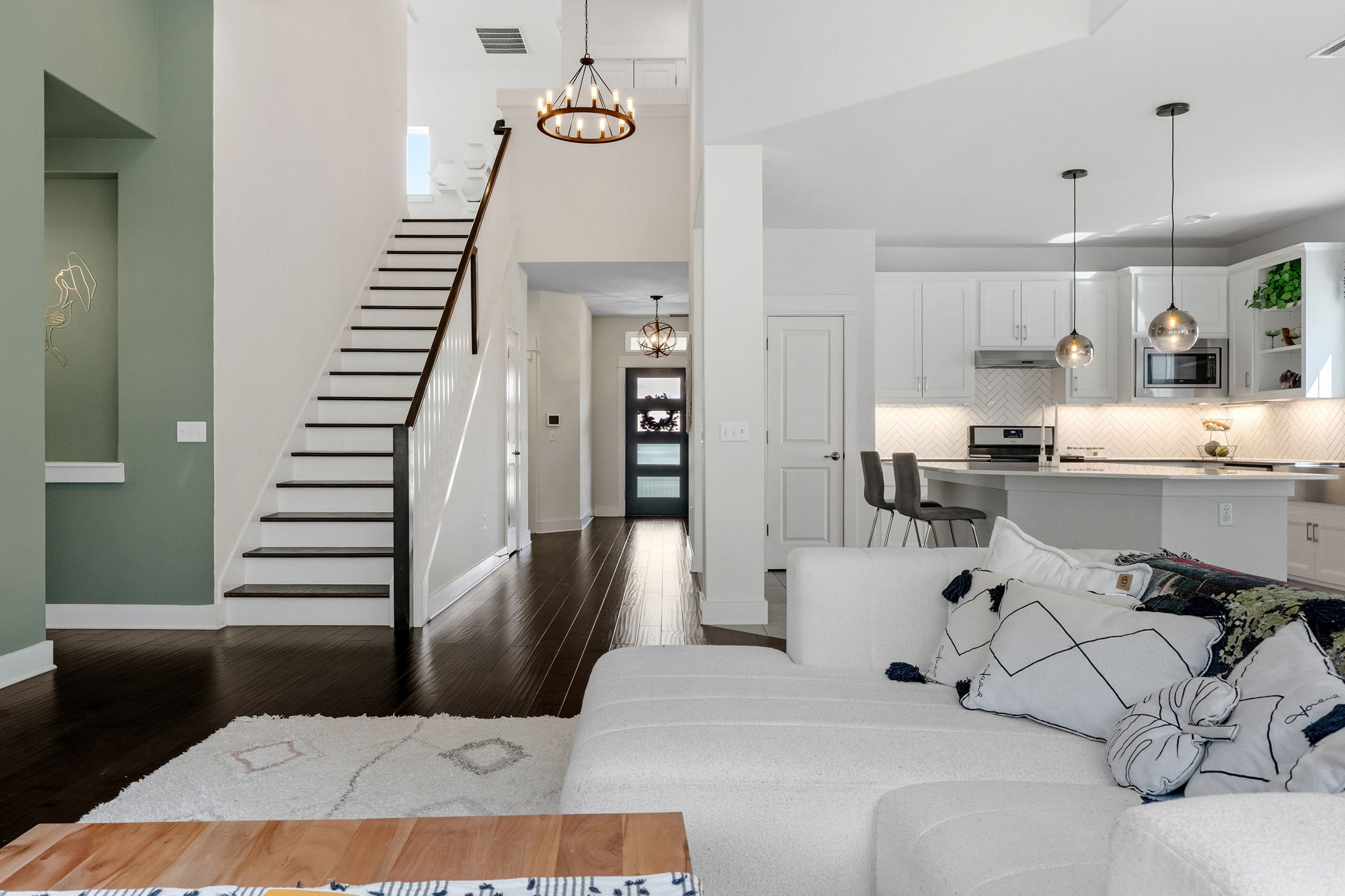7205 Albert Road Austin, TX 78745 - Photo 3 of 37 a kitchen with stainless steel appliances kitchen island granite countertop a refrigerator and a sink