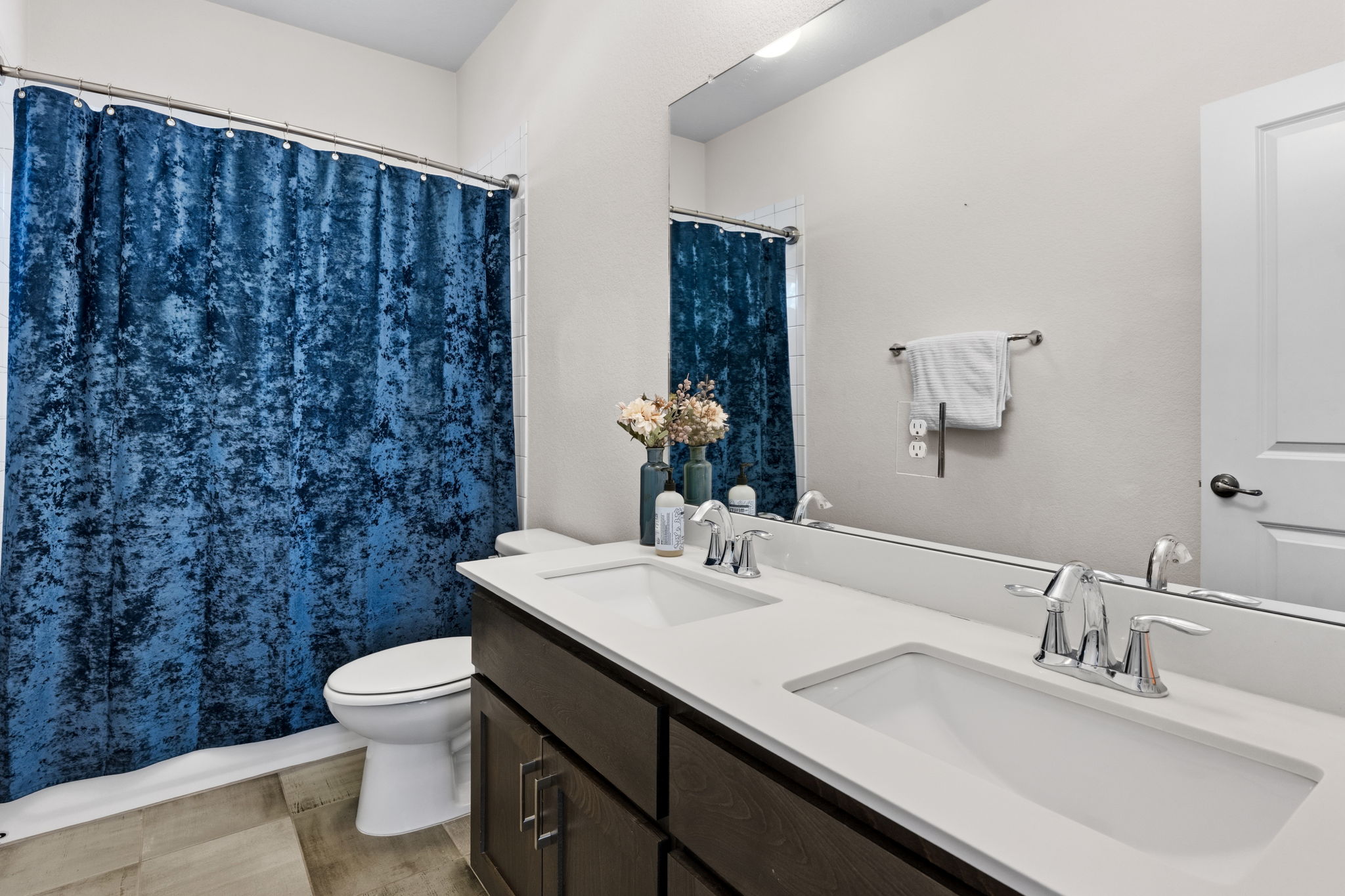 7205 Albert Road Austin, TX 78745 - Photo 33 of 37 a bathroom with a sink a toilet and mirror