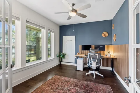 a workspace with furniture and a window
