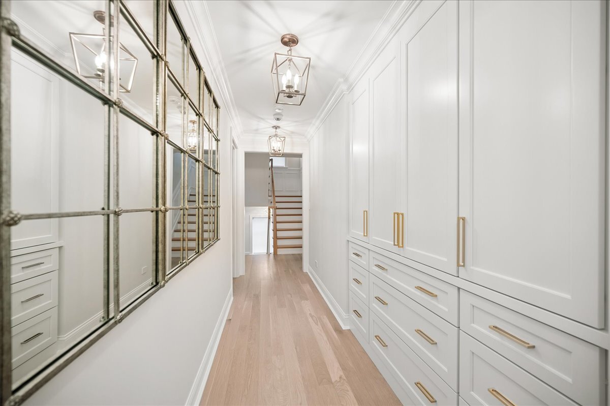 525 Ash Street Winnetka, IL 60093 - Photo 38 of 56 a view of a hallway with wooden floor