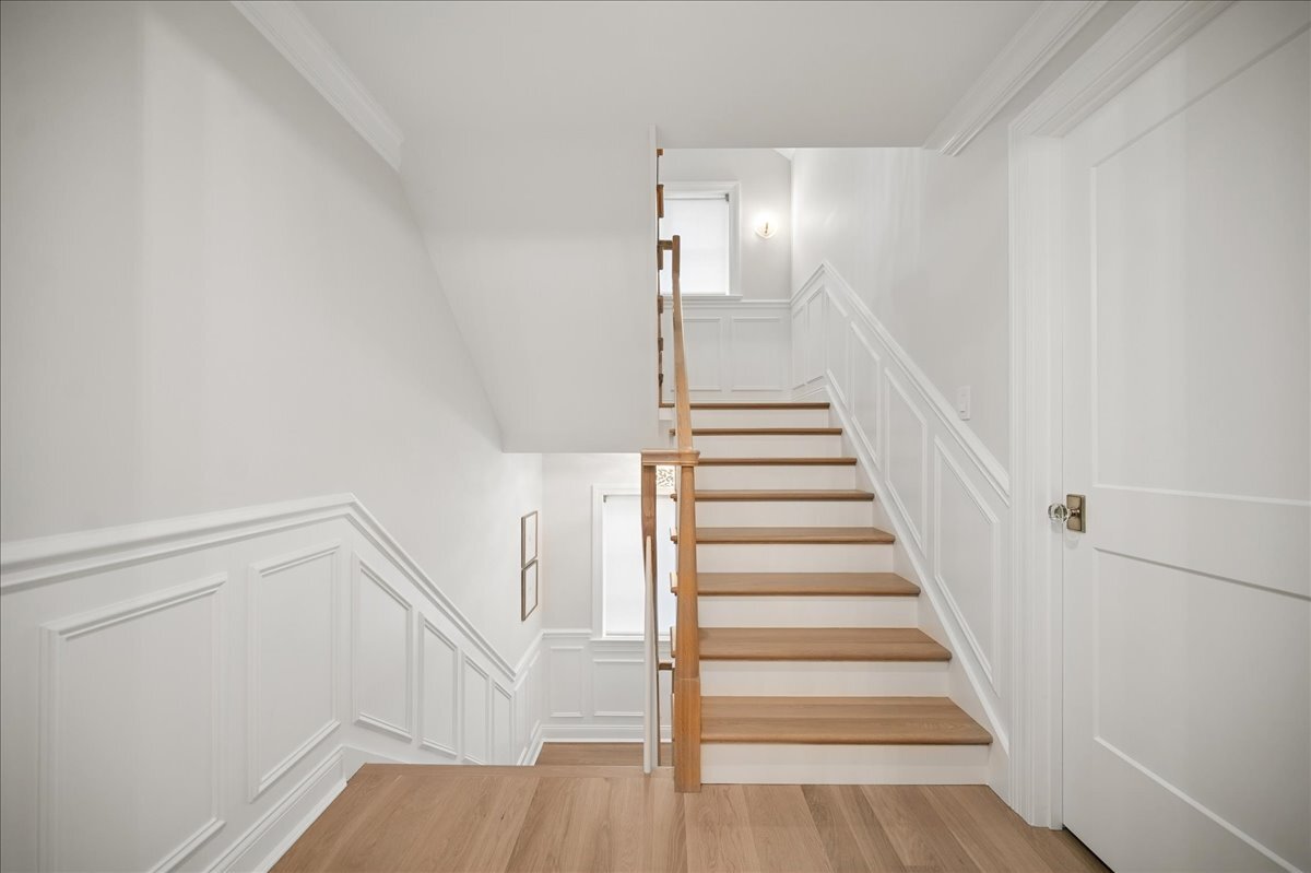 525 Ash Street Winnetka, IL 60093 - Photo 39 of 56 a view of entryway and hall with wooden floor
