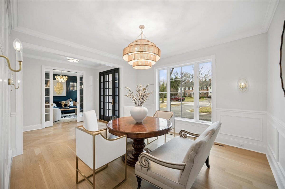 525 Ash Street Winnetka, IL 60093 - Photo 4 of 56 a view of a dining room with furniture wooden floor and chandelier