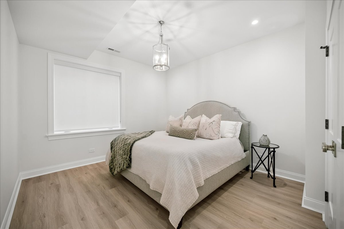 525 Ash Street Winnetka, IL 60093 - Photo 53 of 56 a bedroom with a bed and a window