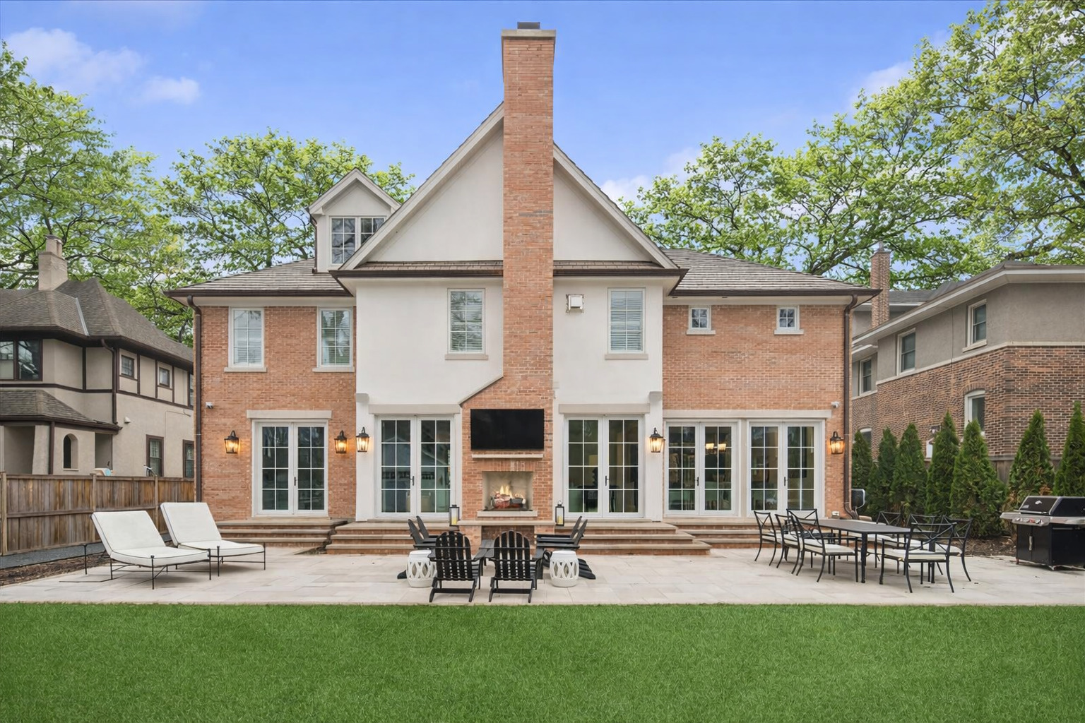 525 Ash Street Winnetka, IL 60093 - Photo 55 of 56 a view of a house with a yard chairs and table