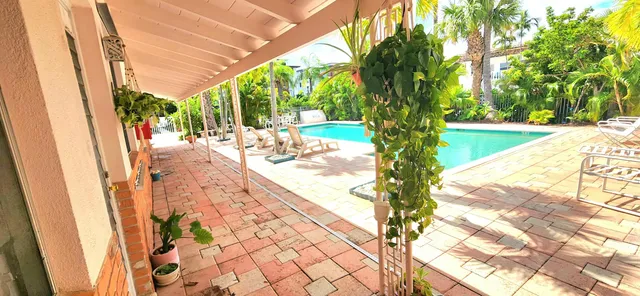 a view of a backyard of the house