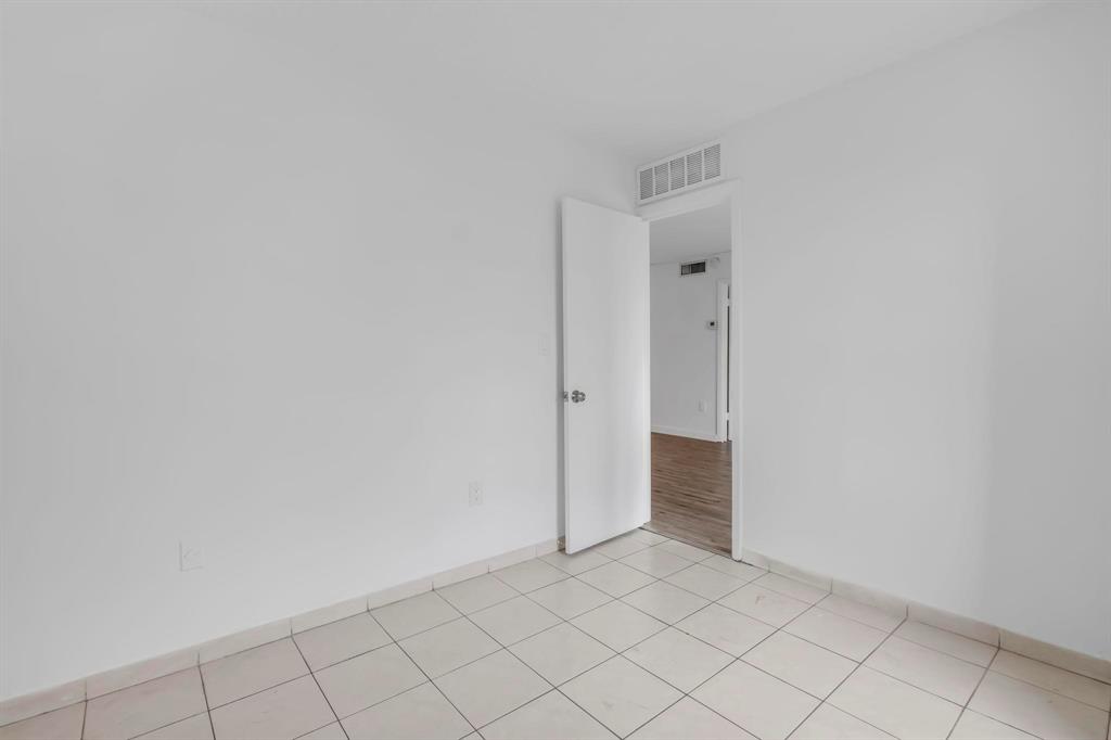 4801 Northwest 7th Street, Unit 50316 Miami, FL 33126 - Photo 12 of 31 a view of an empty room