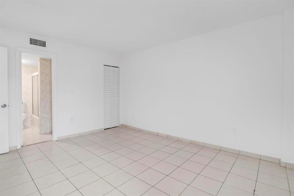 4801 Northwest 7th Street, Unit 50316 Miami, FL 33126 - Photo 14 of 31 a view of an empty room