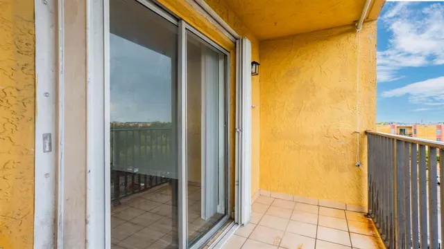 a view of a bathroom from a hallway