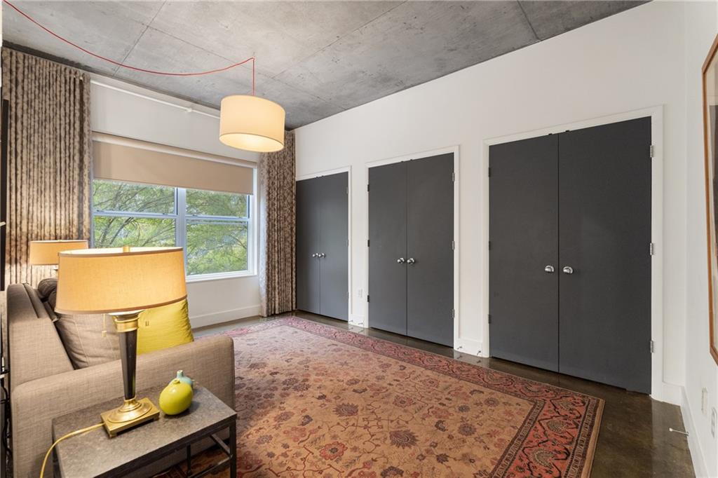 845 Spring Street Northwest, Unit 129 Atlanta, GA 30308 - Photo 22 of 48 a view of an empty room and window