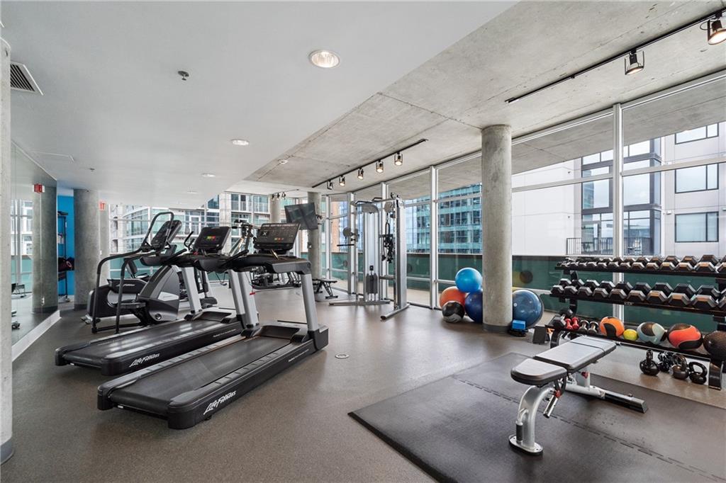 845 Spring Street Northwest, Unit 129 Atlanta, GA 30308 - Photo 40 of 48 a view of a room with gym equipment