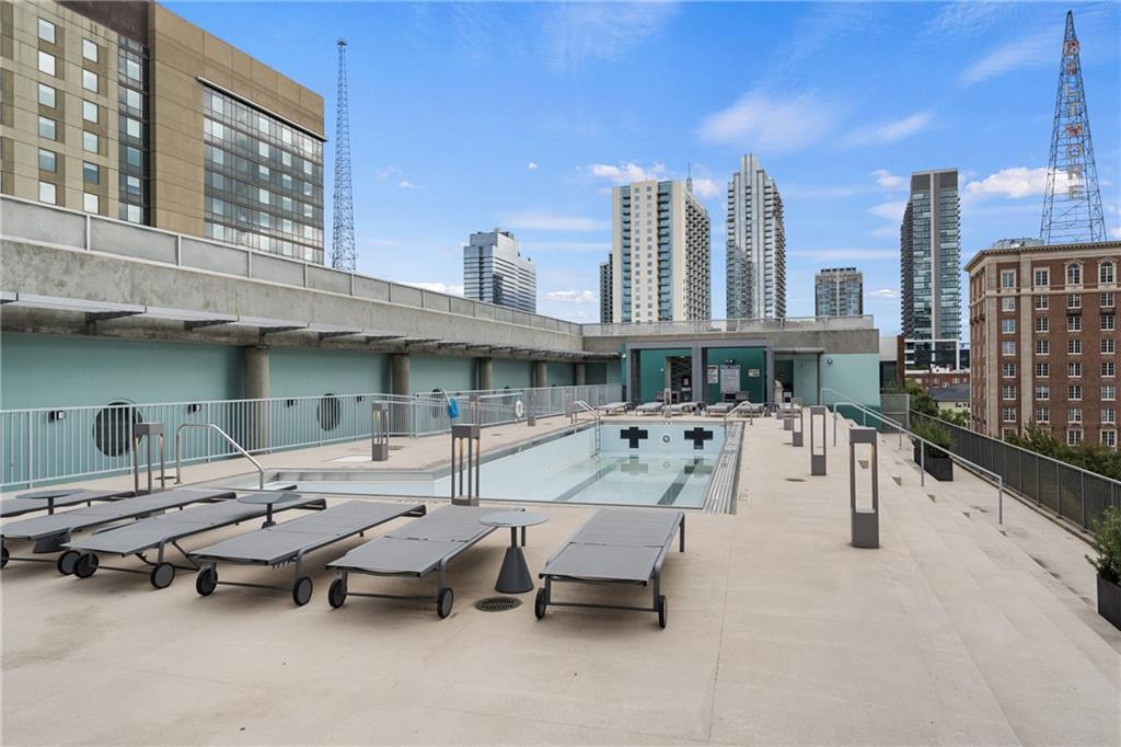 845 Spring Street Northwest, Unit 129 Atlanta, GA 30308 - Photo 45 of 48 a view of a terrace with sitting area