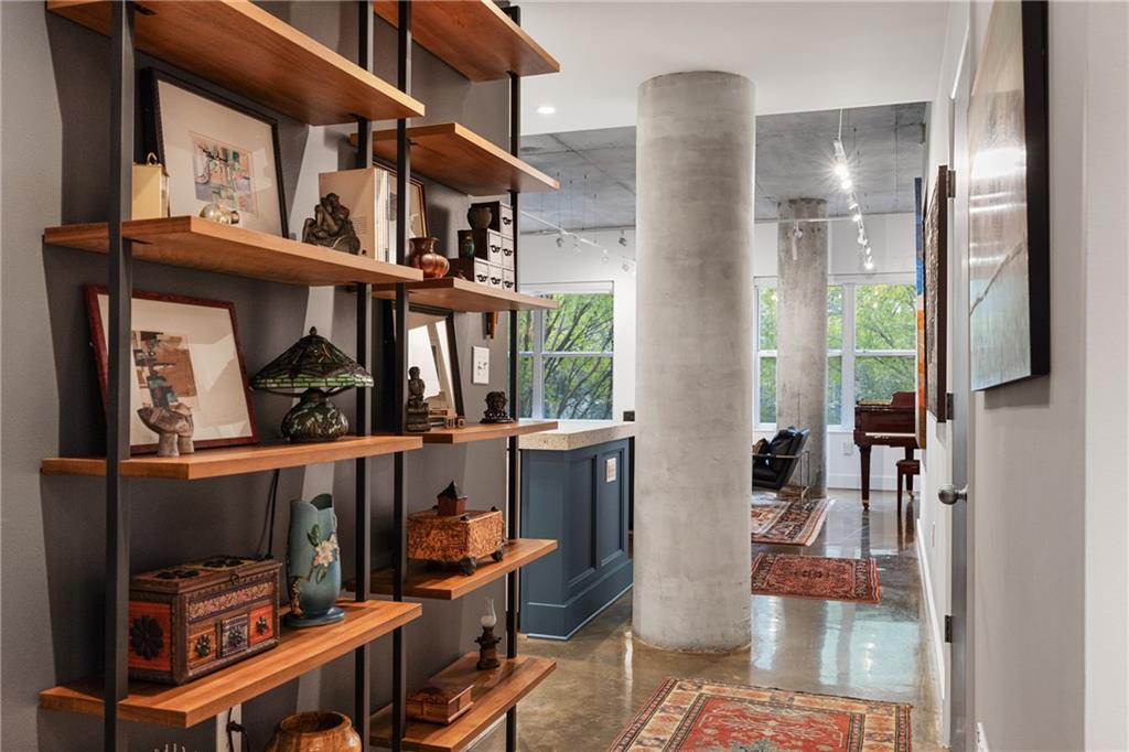845 Spring Street Northwest, Unit 129 Atlanta, GA 30308 - Photo 6 of 48 a view of entryway and workspace
