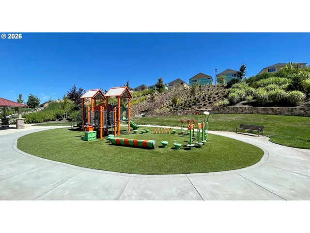 an aerial view of a house with a lake view