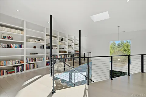 a view of a balcony with chairs