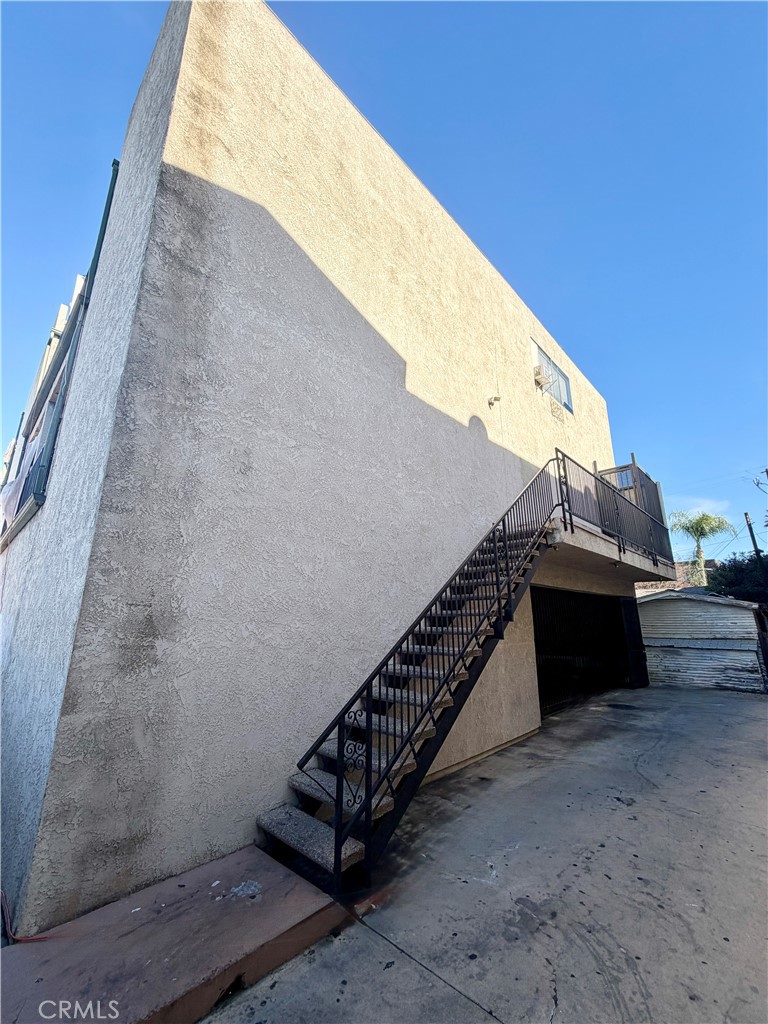 710 West Washington Avenue Santa Ana, CA 92706 - Photo 10 of 10 a view of a balcony with bed and wooden fence