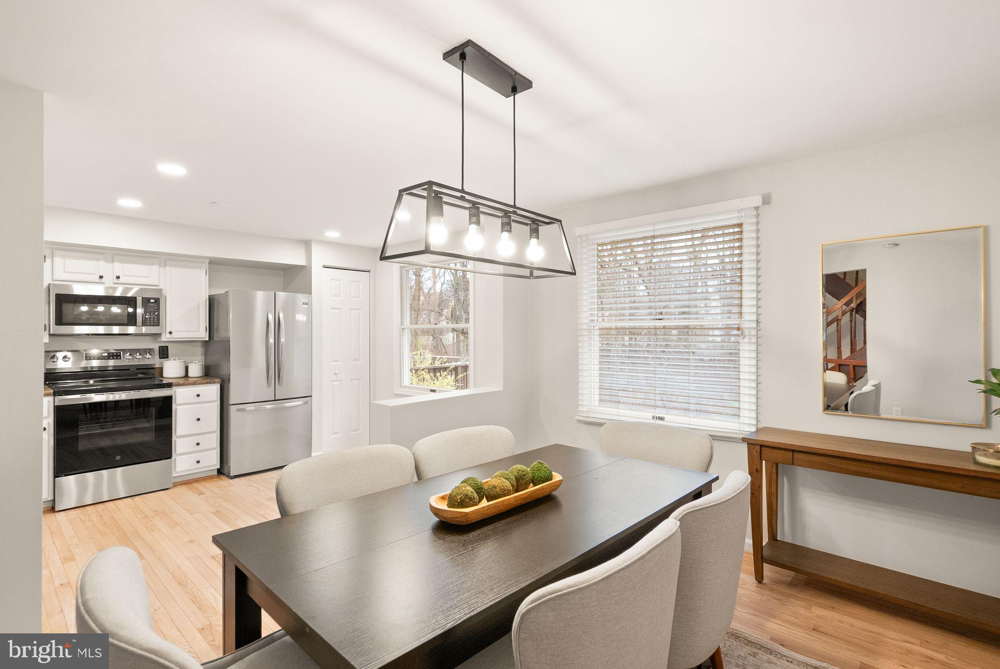 1548 Poplar Grove Drive Reston, VA 20194 - Photo 14 of 55 Dining room open to kitchen