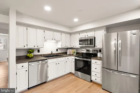 $585,000 | 1548 Poplar Grove Drive, Reston, VA 20194