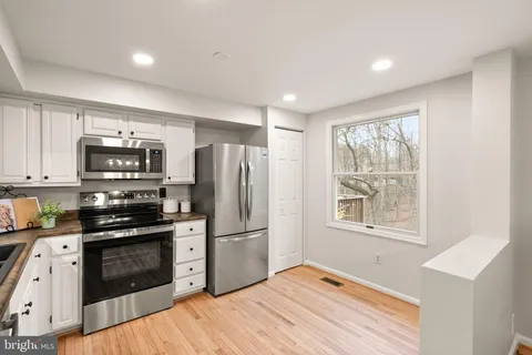 $585,000 | 1548 Poplar Grove Drive, Reston, VA 20194