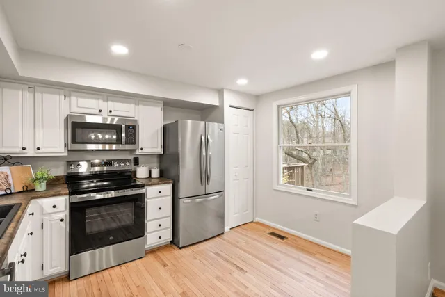 $585,000 | 1548 Poplar Grove Drive, Reston, VA 20194