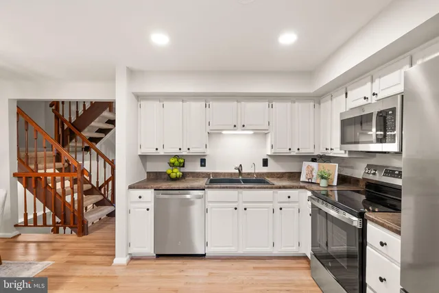 $585,000 | 1548 Poplar Grove Drive, Reston, VA 20194