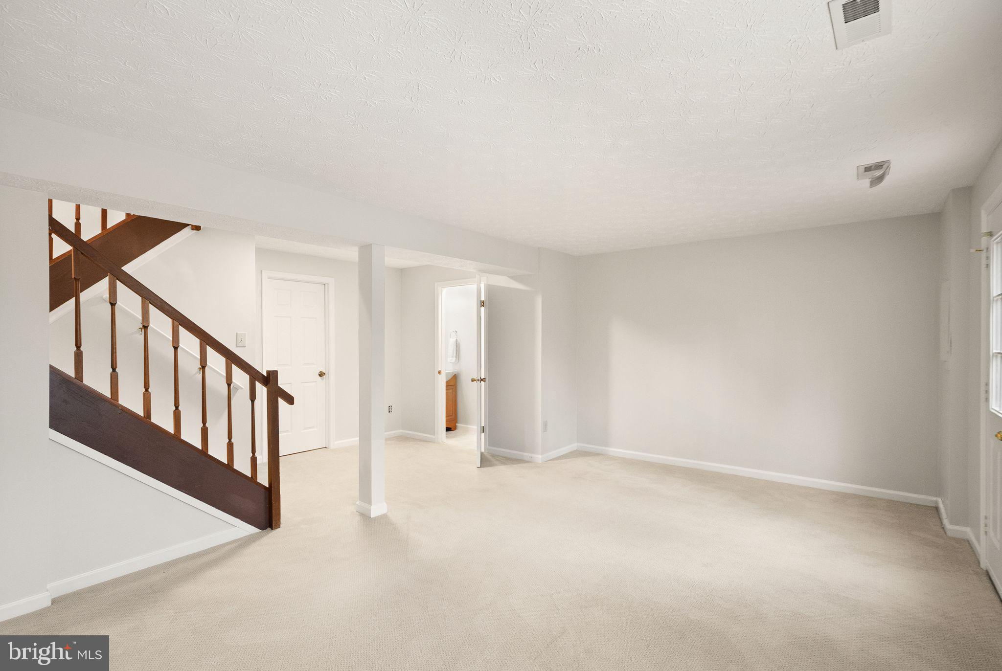 1548 Poplar Grove Drive Reston, VA 20194 - Photo 40 of 55 Spacious lower level recreation room
