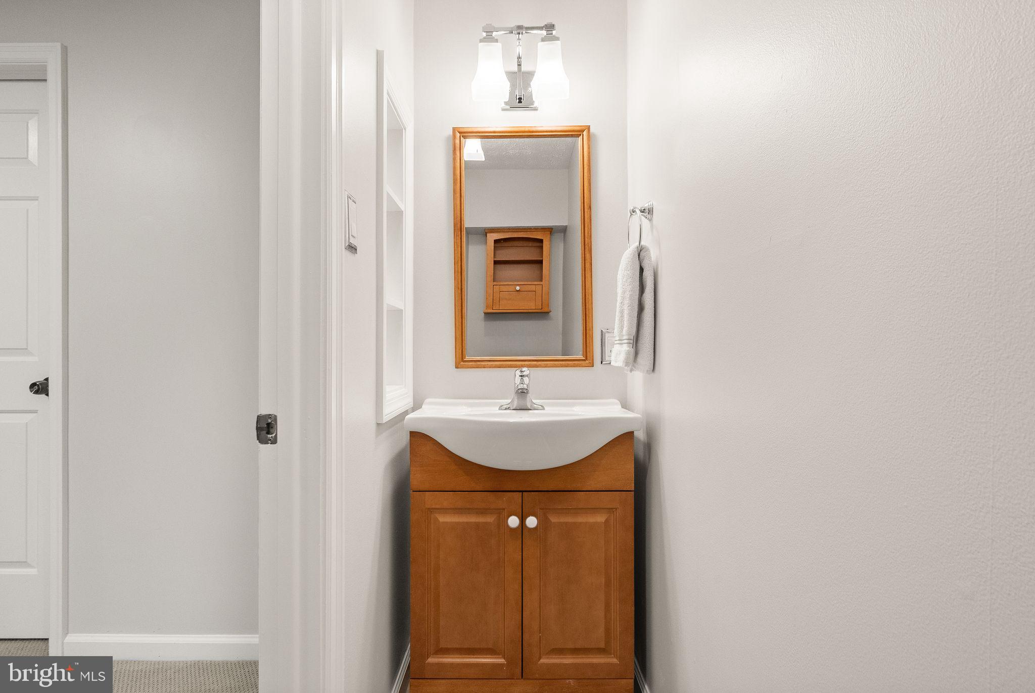 1548 Poplar Grove Drive Reston, VA 20194 - Photo 42 of 55 Lower level powder room