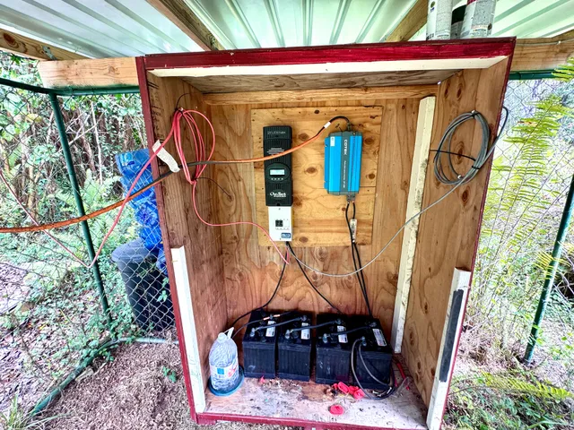 a bathroom with a shower and a mirror