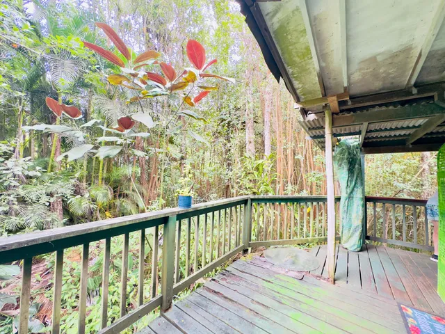 a view of balcony with wooden floor