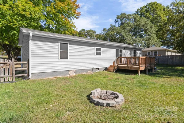 a view of a backyard with a garden and plants