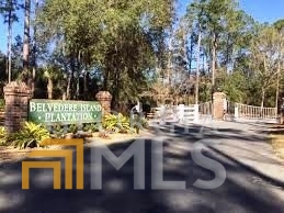 0 Winterberry, Unit 158 Townsend, GA 31331 - Photo 1 of 1 a view of a yard with table and chairs